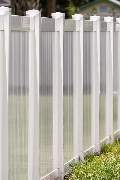 close up of white vinyl privacy fence evansville in