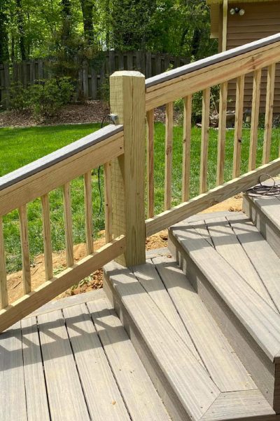 house deck close up with wooden railings installed evansville in