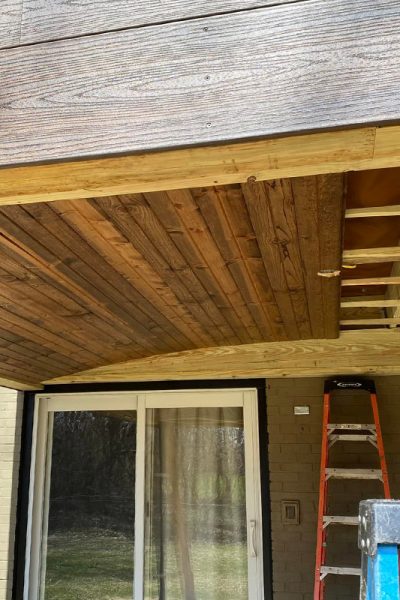 house porch with wooden cover installation in process evansville in